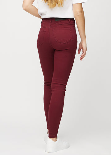 Dunkelrote skinny jeans von hinten gesehen, sodass man das gesamte Produkt sehen kann.